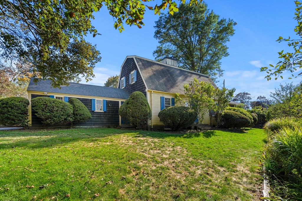 62 Longview Drive Marblehead, MA 01945 - Photo 1 of 42 a view of a house with a yard and potted plants
