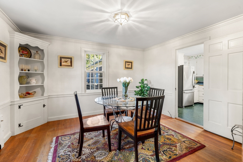 62 Longview Drive Marblehead, MA 01945 - Photo 11 of 42 a view of a dining room with furniture and wooden floor