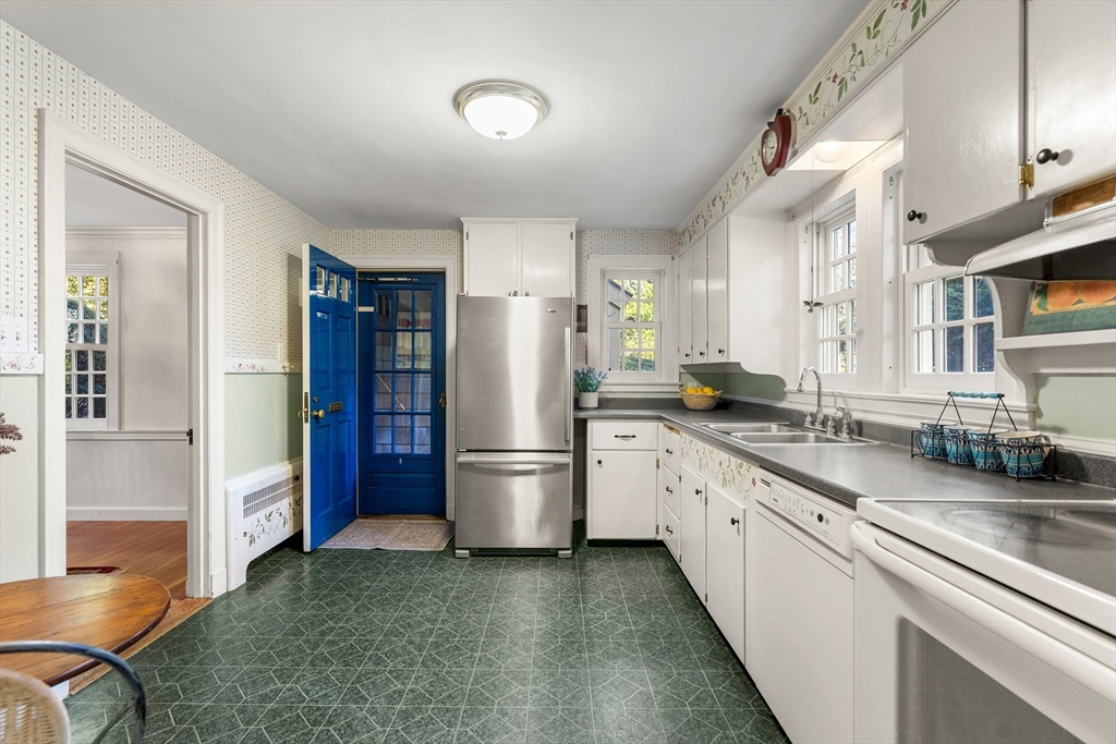 62 Longview Drive Marblehead, MA 01945 - Photo 14 of 42 a kitchen with a refrigerator and a sink