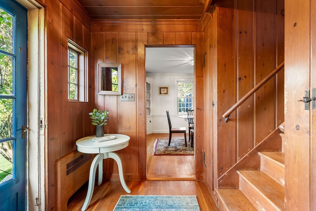 62 Longview Drive Marblehead, MA 01945 - Photo 20 of 42 a view of a hallway with furniture and wooden floor