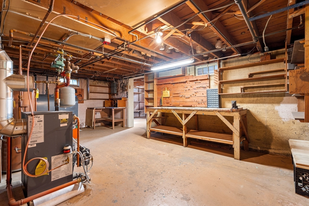 62 Longview Drive Marblehead, MA 01945 - Photo 28 of 42 a view of a storage room with racks