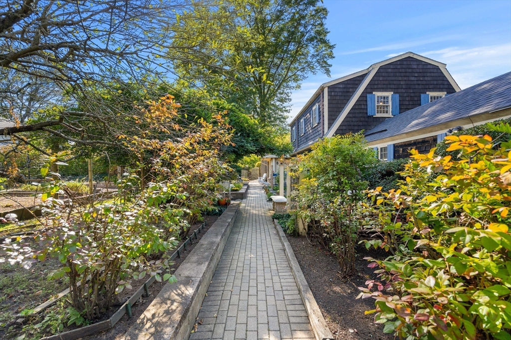 62 Longview Drive Marblehead, MA 01945 - Photo 35 of 42 a view of a pathway both side of the house