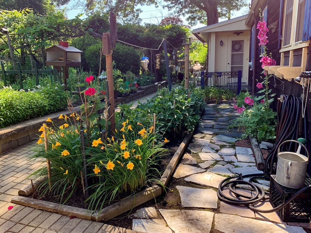 62 Longview Drive Marblehead, MA 01945 - Photo 38 of 42 a view of a house with a backyard and sitting area