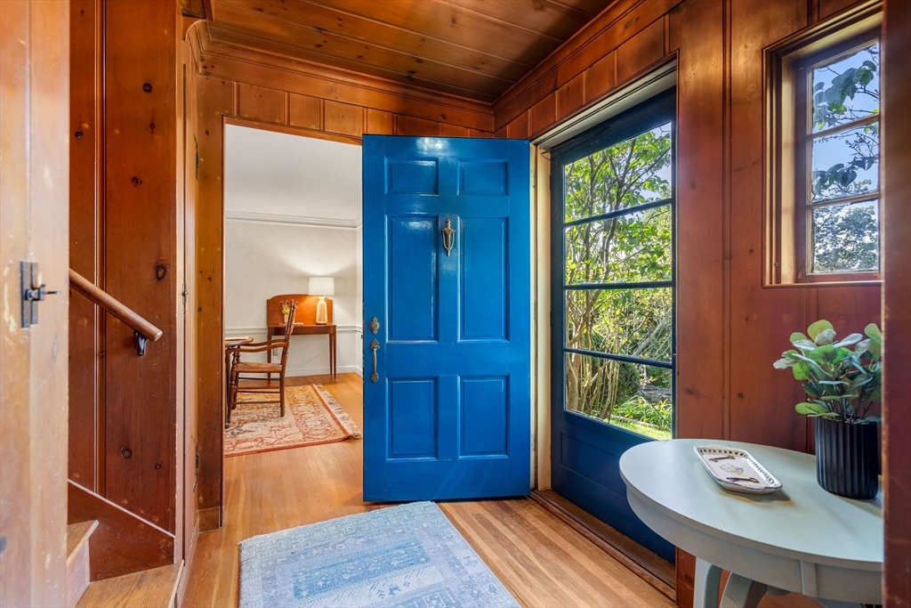 62 Longview Drive Marblehead, MA 01945 - Photo 4 of 42 a living room with furniture and a potted plant
