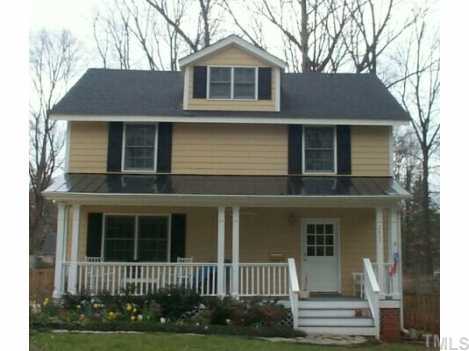 2807 Oberry Street, Unit B Raleigh, NC 27607 - Photo 1 of 1 a front view of a house with a yard