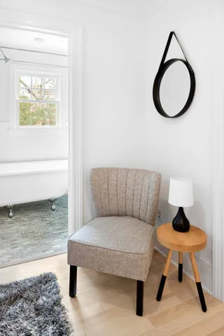 a living room with a rug