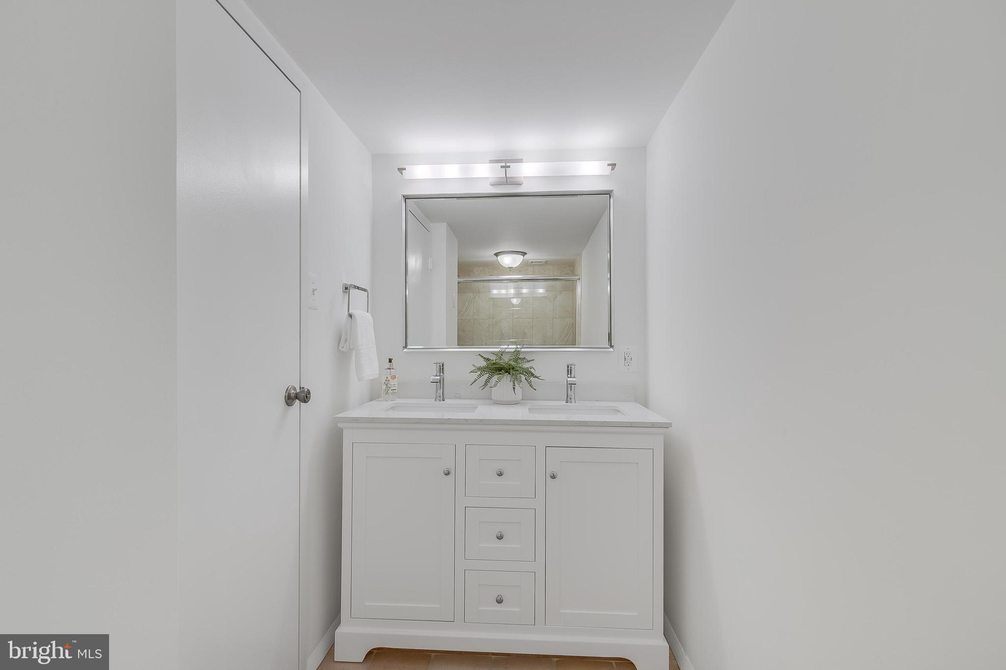 6800 Fleetwood Road, Unit 802 McLean, VA 22101 - Photo 26 of 39 Renovated bath