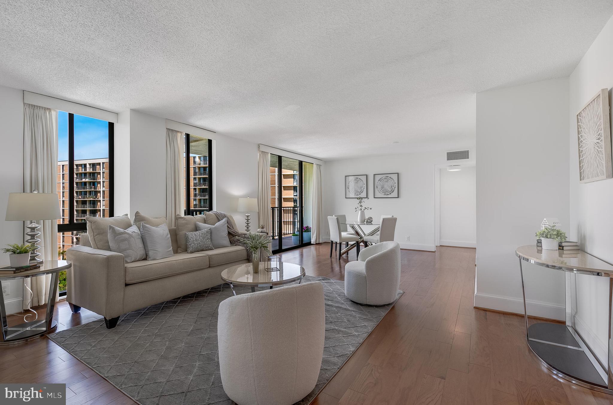 6800 Fleetwood Road, Unit 802 McLean, VA 22101 - Photo 5 of 39 Family room open to dining