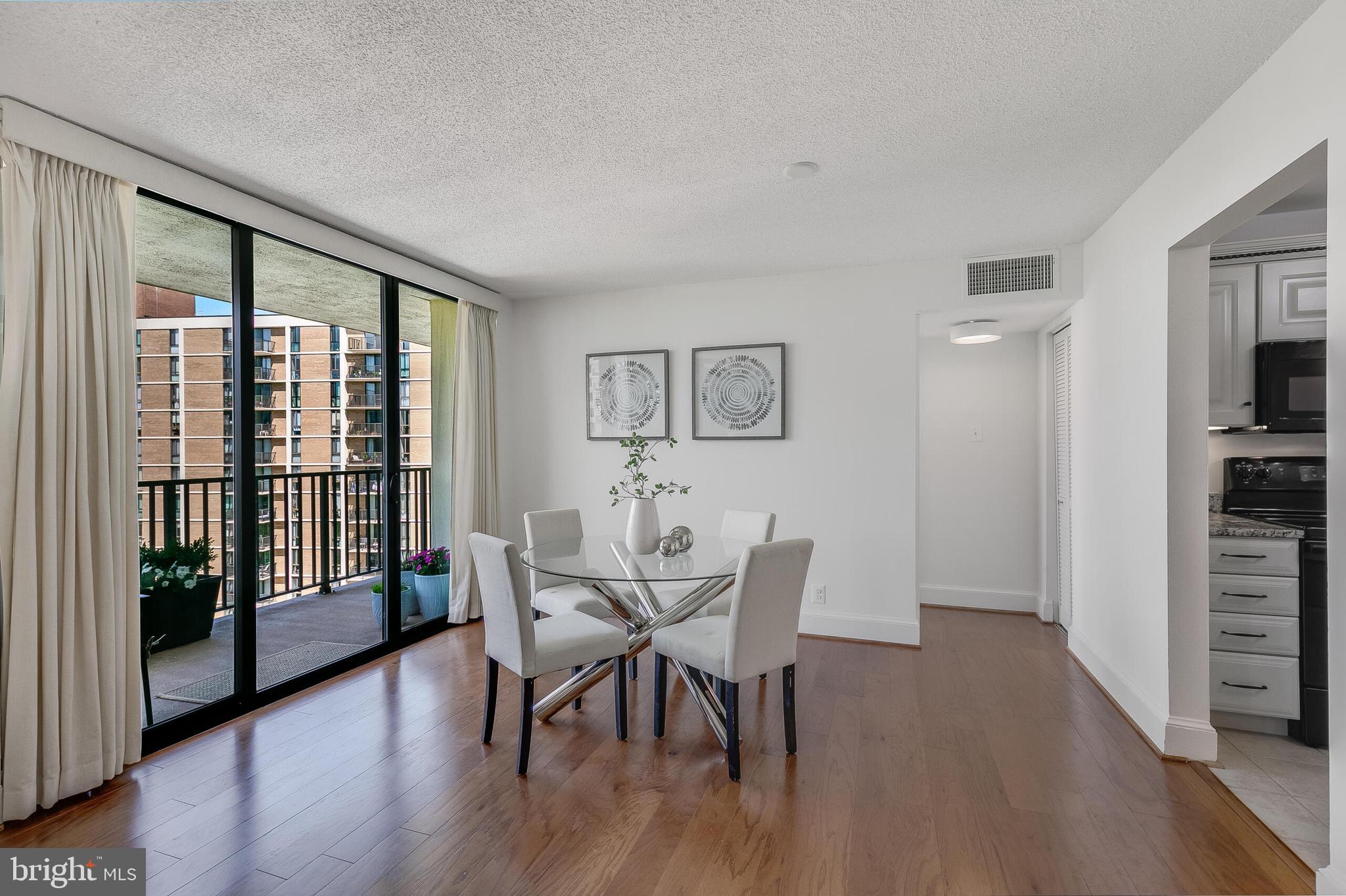 6800 Fleetwood Road, Unit 802 McLean, VA 22101 - Photo 8 of 39 Dining area with large balcony