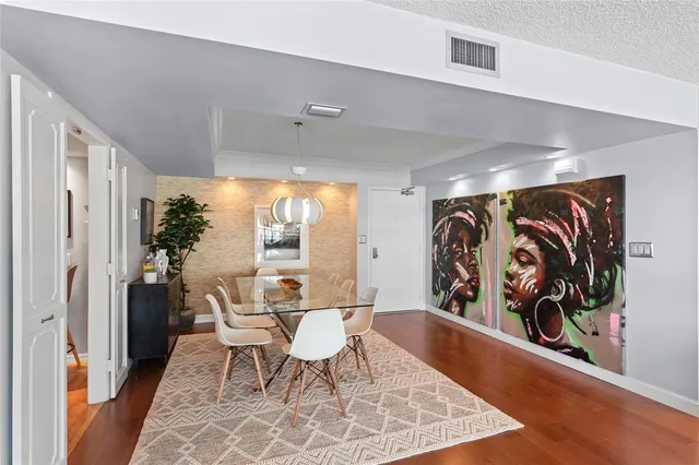 a view of a livingroom with furniture and a window