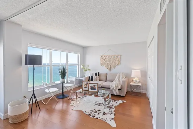 a kitchen with stainless steel appliances granite countertop wooden cabinets and sink