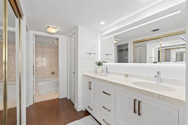 a view of a city with tall buildings