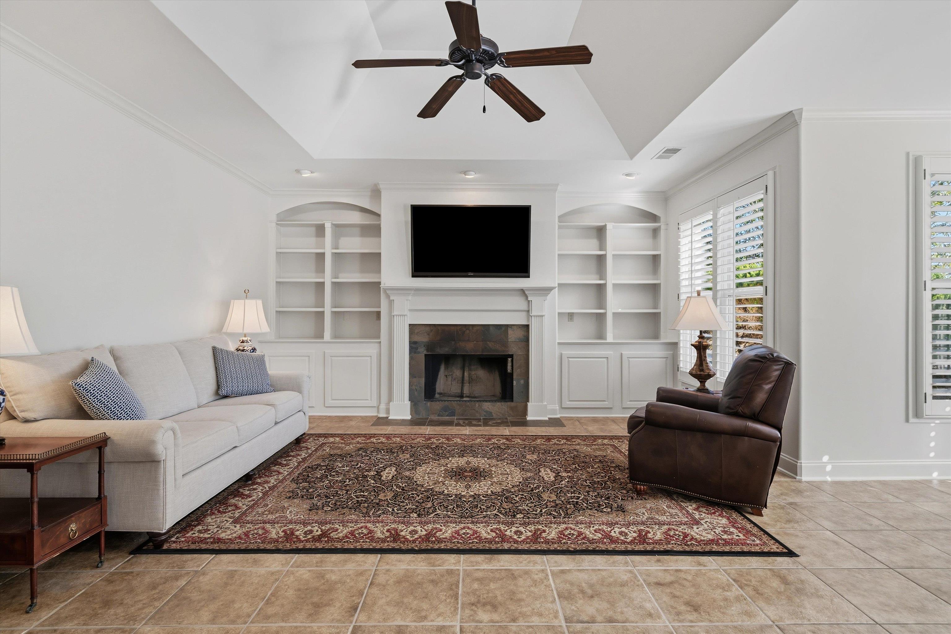 639 Critz Cove Collierville, TN 38017 - Photo 11 of 40 a living room with furniture and a fireplace