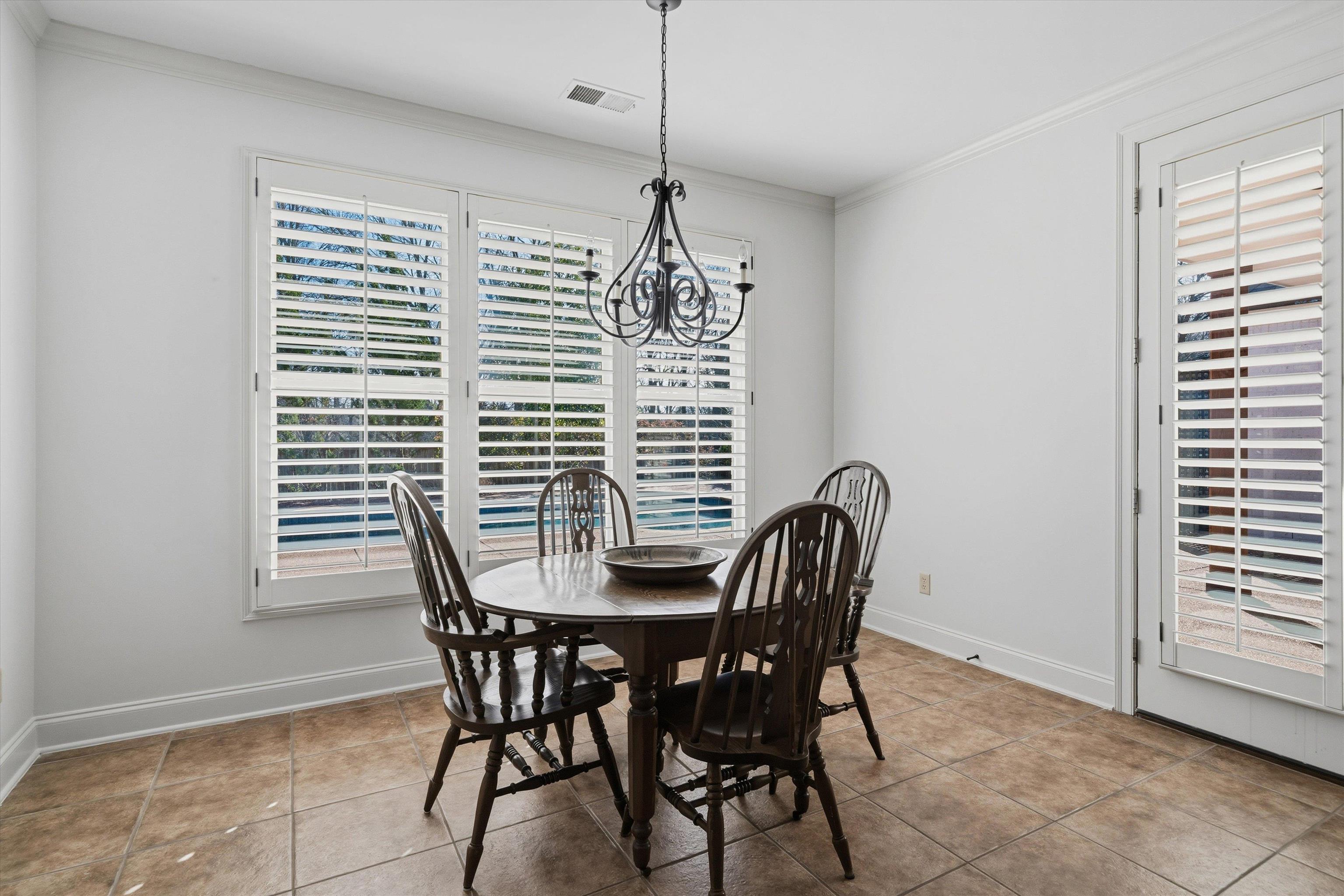639 Critz Cove Collierville, TN 38017 - Photo 13 of 40 a view of a dining room with furniture and window