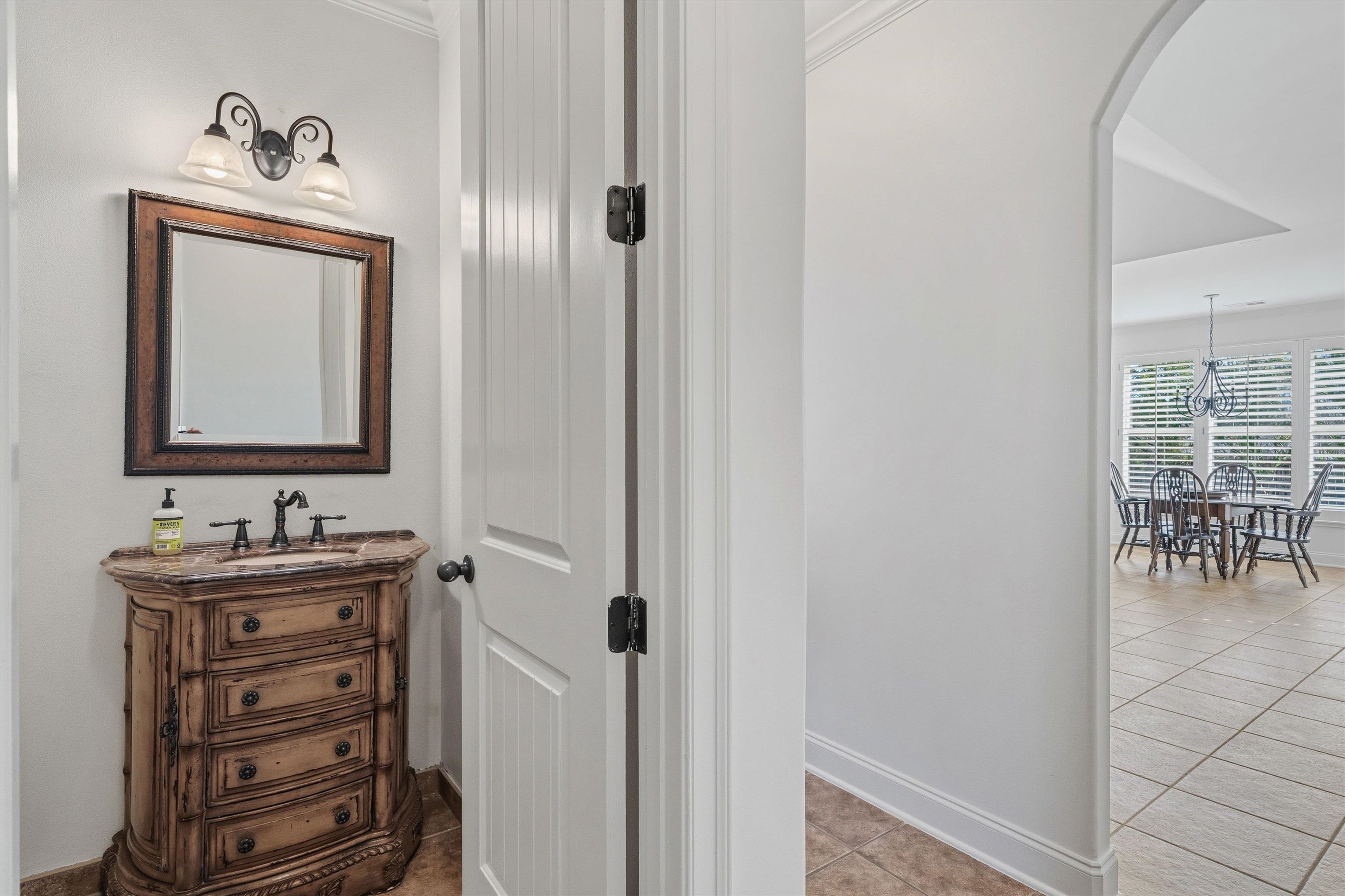 639 Critz Cove Collierville, TN 38017 - Photo 18 of 40 a bathroom with a toilet sink and mirror