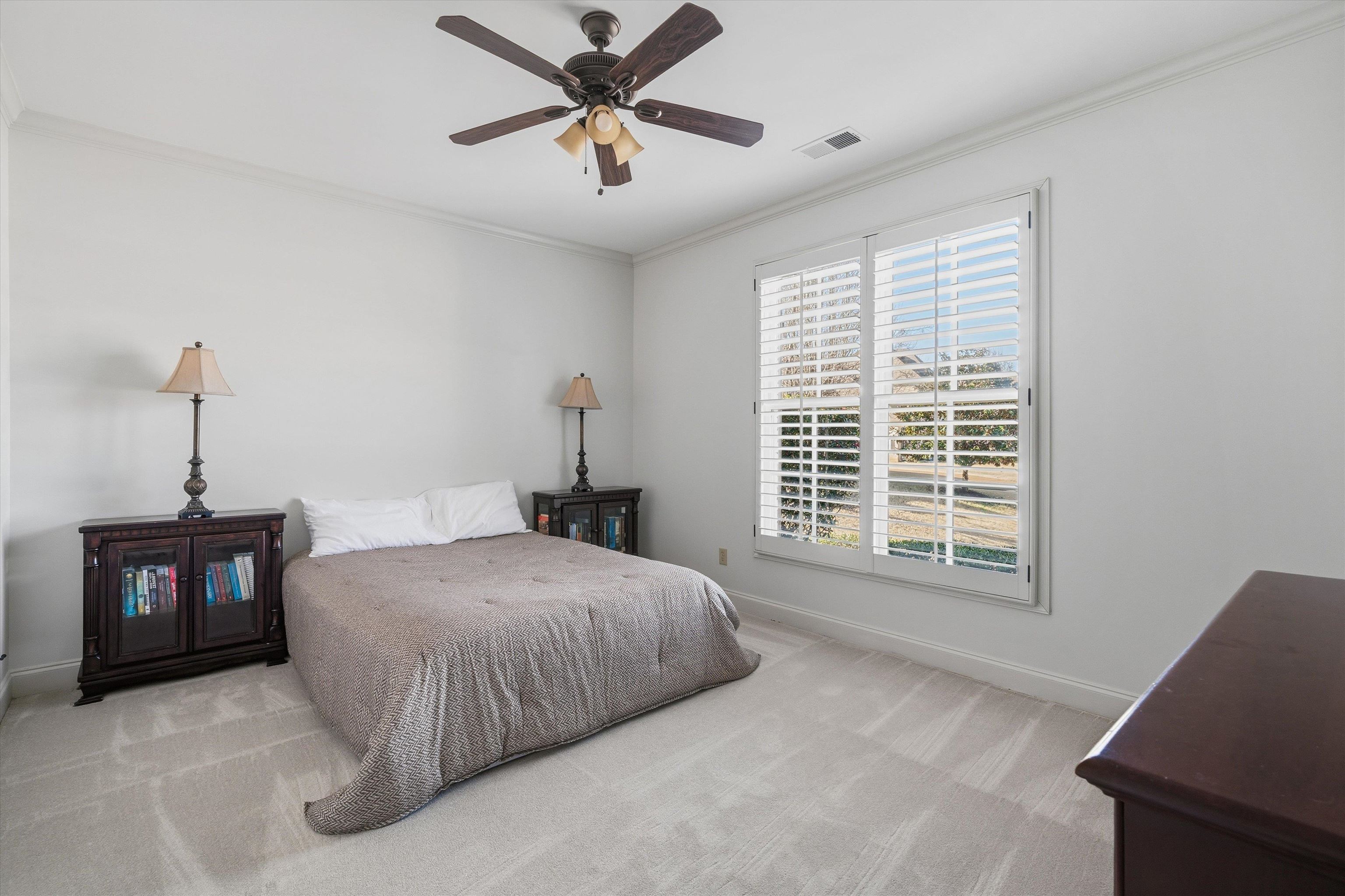 639 Critz Cove Collierville, TN 38017 - Photo 25 of 40 a bedroom with a bed and a window