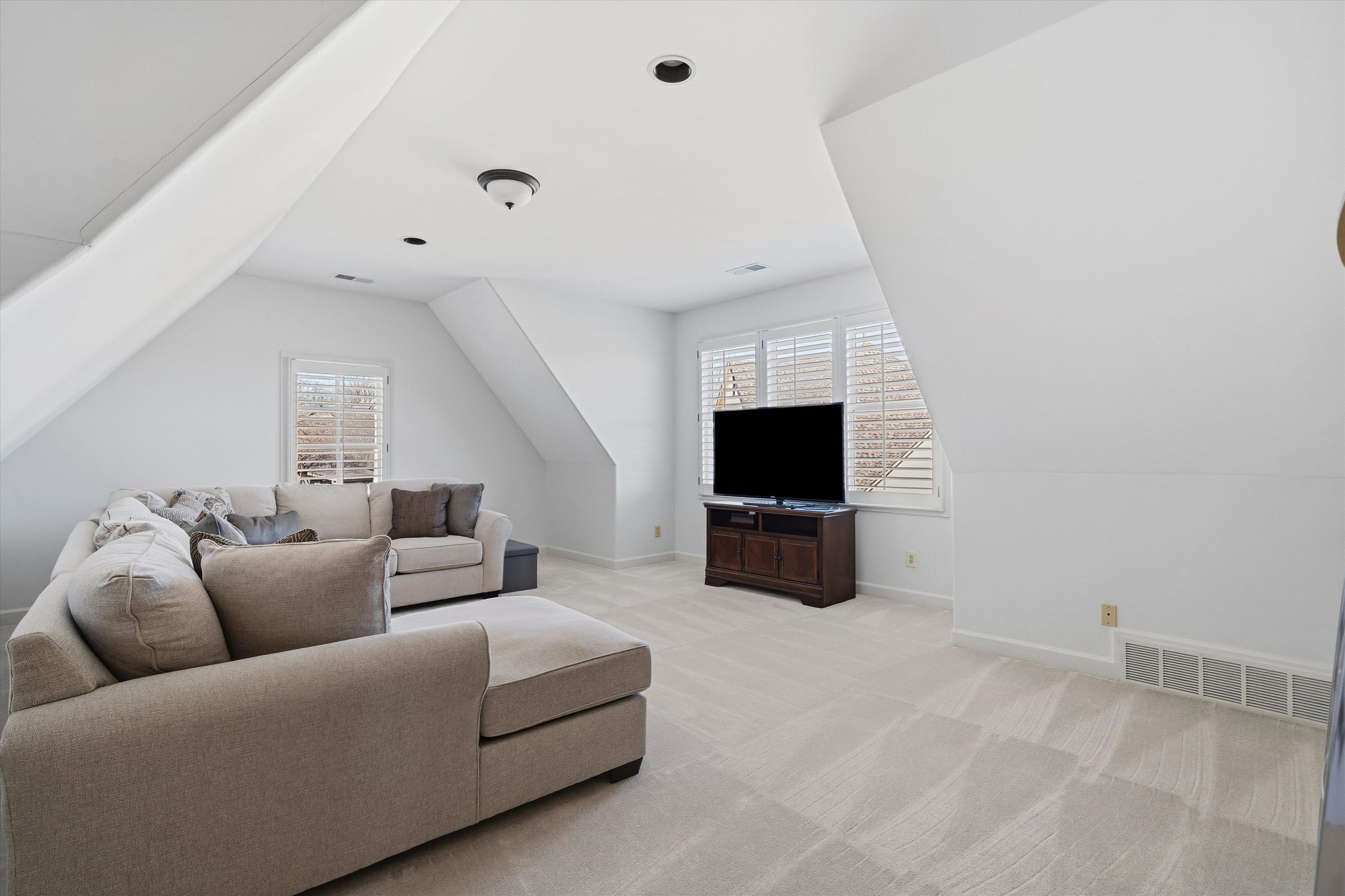 639 Critz Cove Collierville, TN 38017 - Photo 28 of 40 a living room with furniture and a flat screen tv