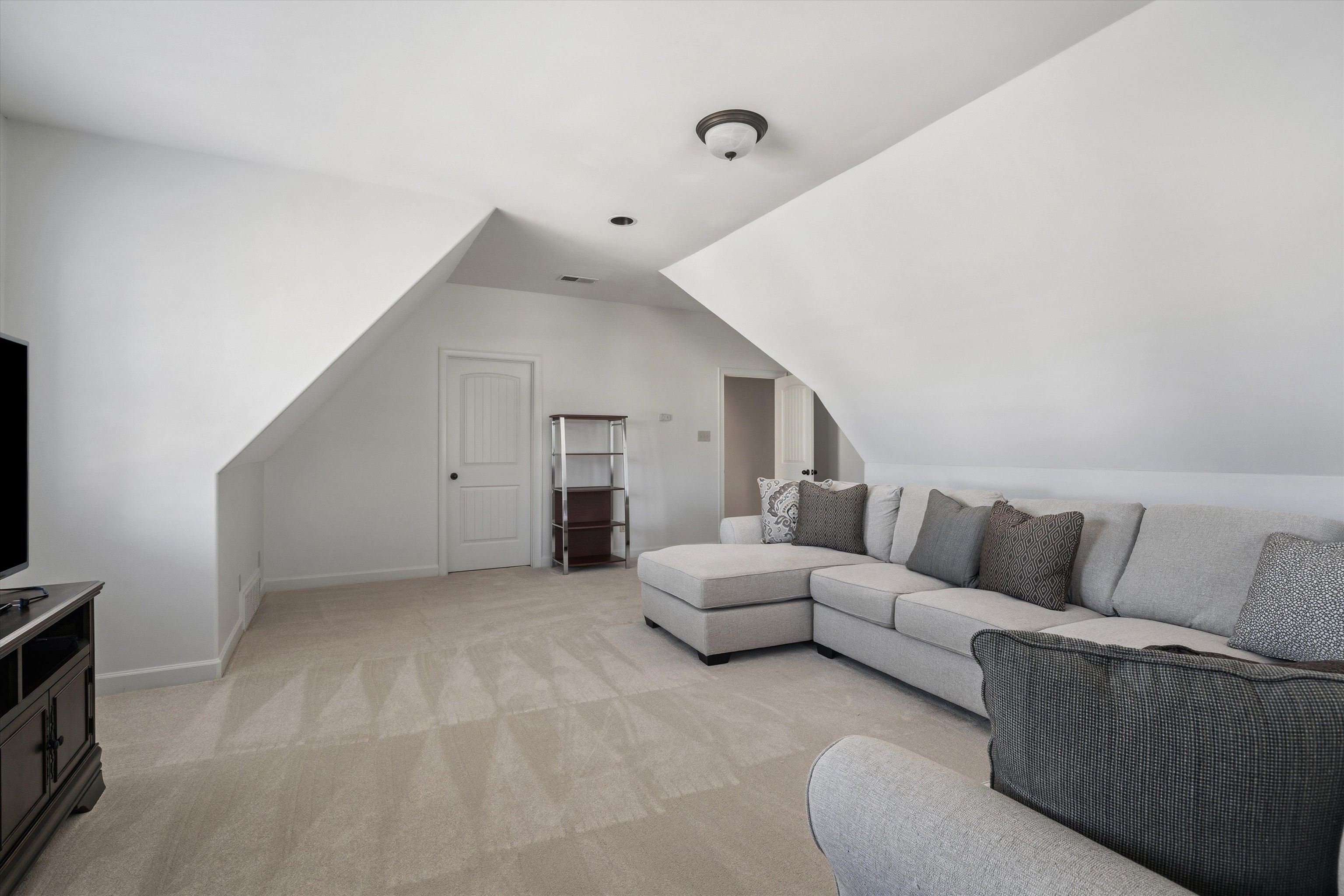 639 Critz Cove Collierville, TN 38017 - Photo 29 of 40 a living room with furniture and a flat screen tv