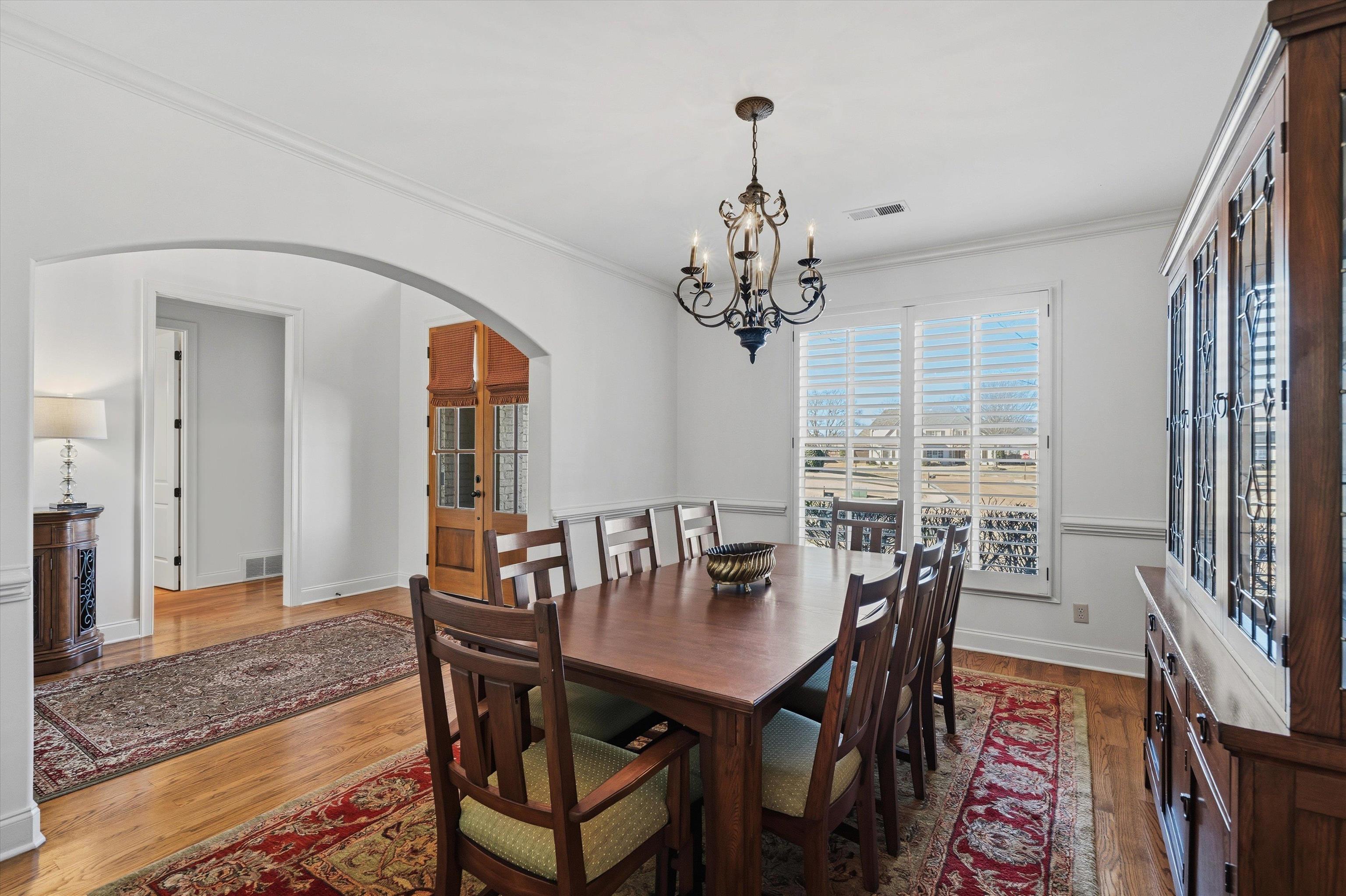 639 Critz Cove Collierville, TN 38017 - Photo 7 of 40 a view of a dining room with furniture window and wooden floor