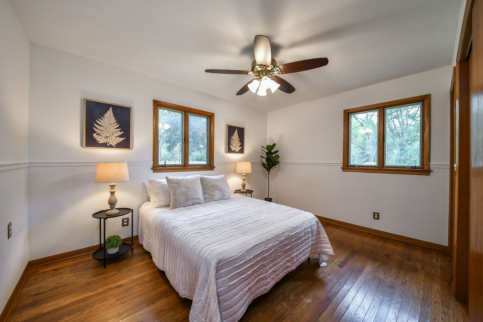 41-w331 Empire Road St. Charles, IL 60175 - Photo 13 of 25 a bedroom with a bed and wooden floor