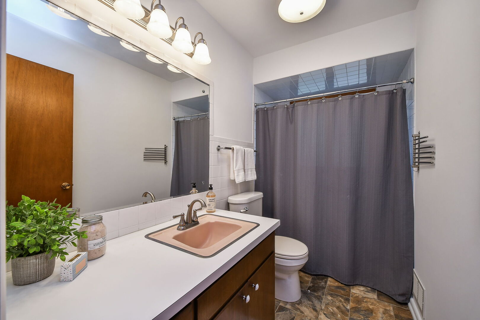 41-w331 Empire Road St. Charles, IL 60175 - Photo 14 of 25 a bathroom with a granite countertop sink a toilet and a mirror