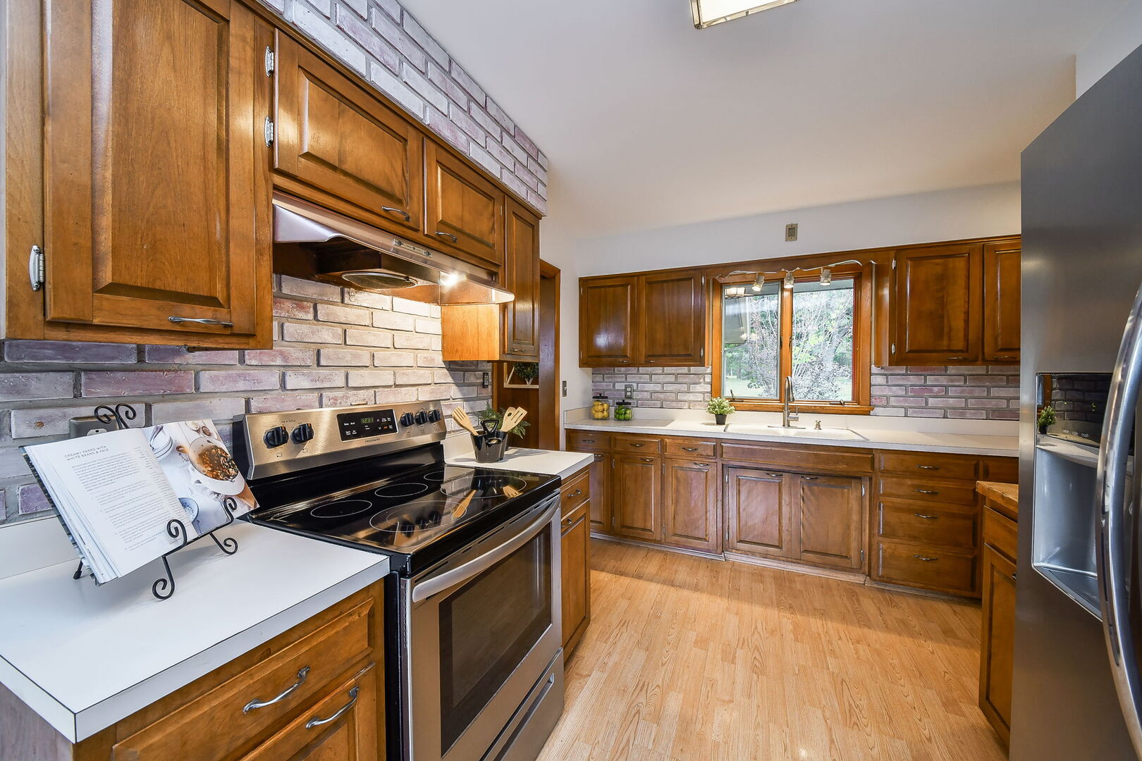 41-w331 Empire Road St. Charles, IL 60175 - Photo 9 of 25 a kitchen with a stove and a sink