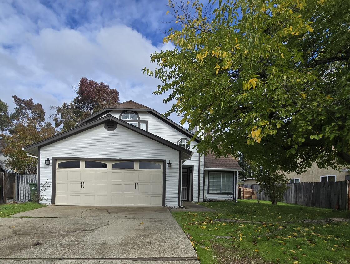 454 Alamine Drive Redding, CA 96003 - Photo 1 of 28 front view of a house with a yard