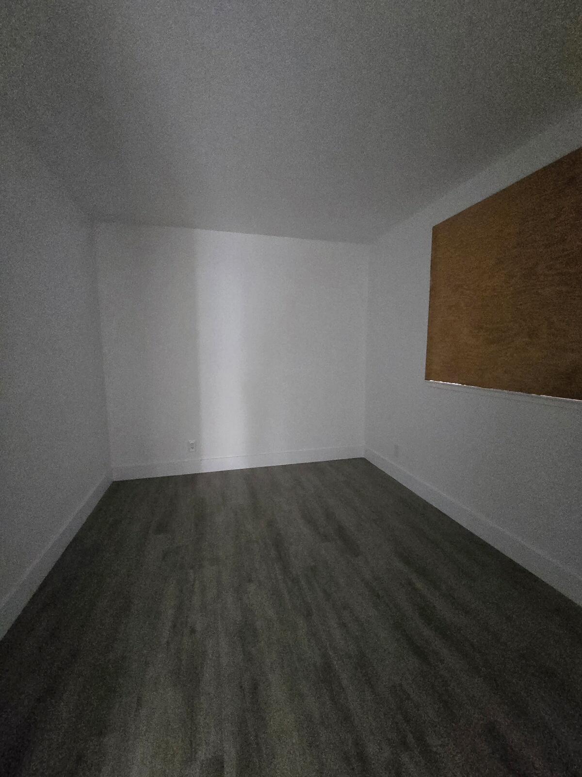 454 Alamine Drive Redding, CA 96003 - Photo 16 of 28 a view of an empty room and wooden floor