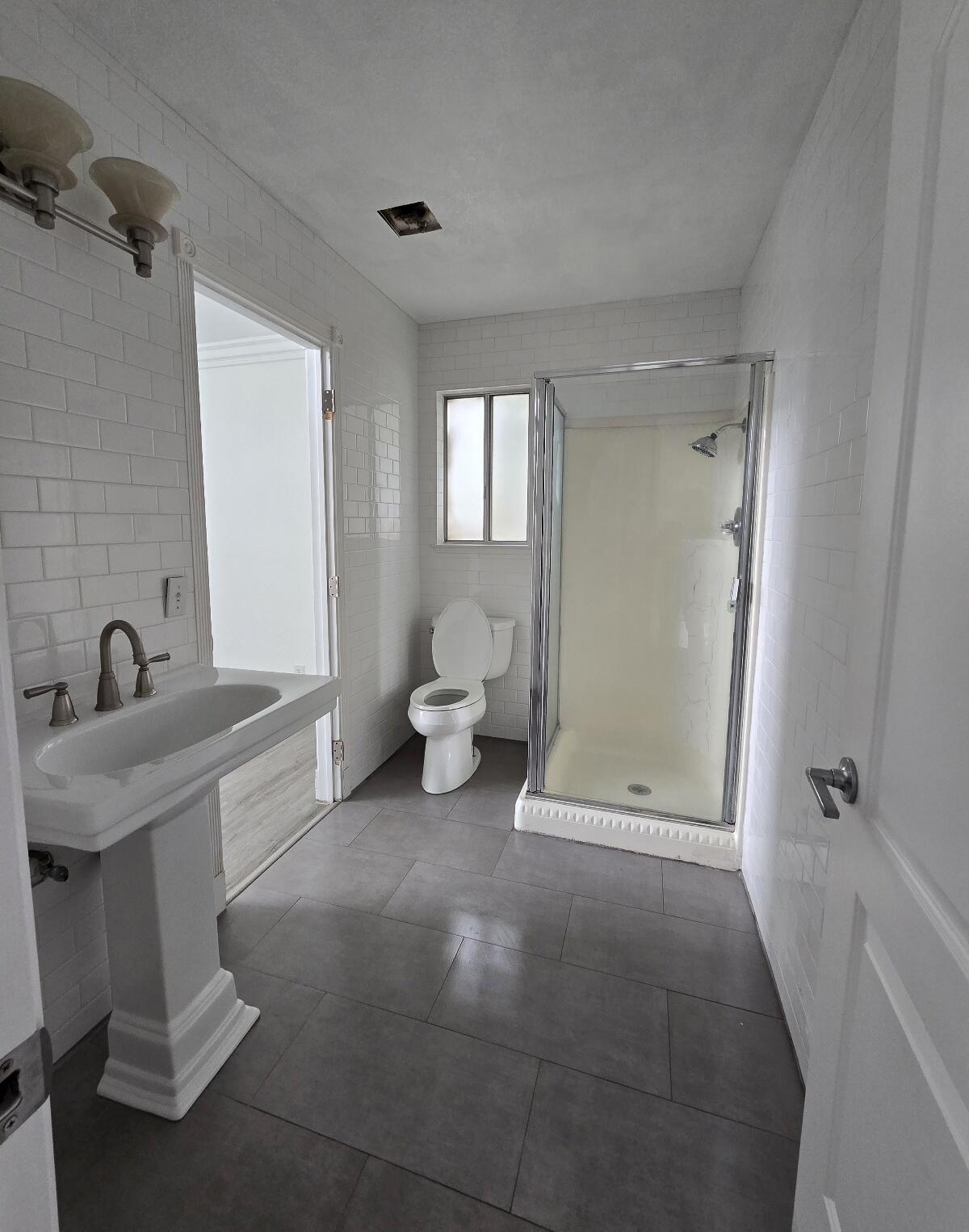 454 Alamine Drive Redding, CA 96003 - Photo 22 of 28 a view of a room with a sink and mirror