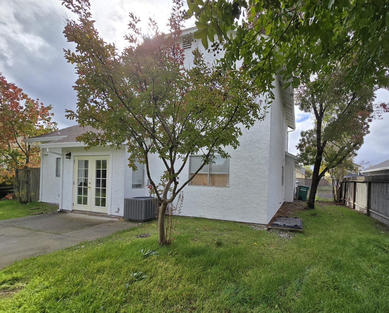 454 Alamine Drive Redding, CA 96003 - Photo 25 of 28 a view of a house with a backyard