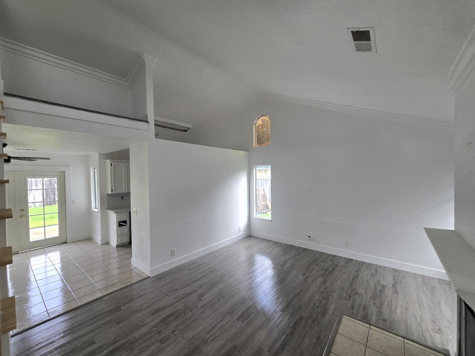 454 Alamine Drive Redding, CA 96003 - Photo 7 of 28 a view of empty room with wooden floor
