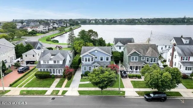 an aerial view of a house with a garden and plants
