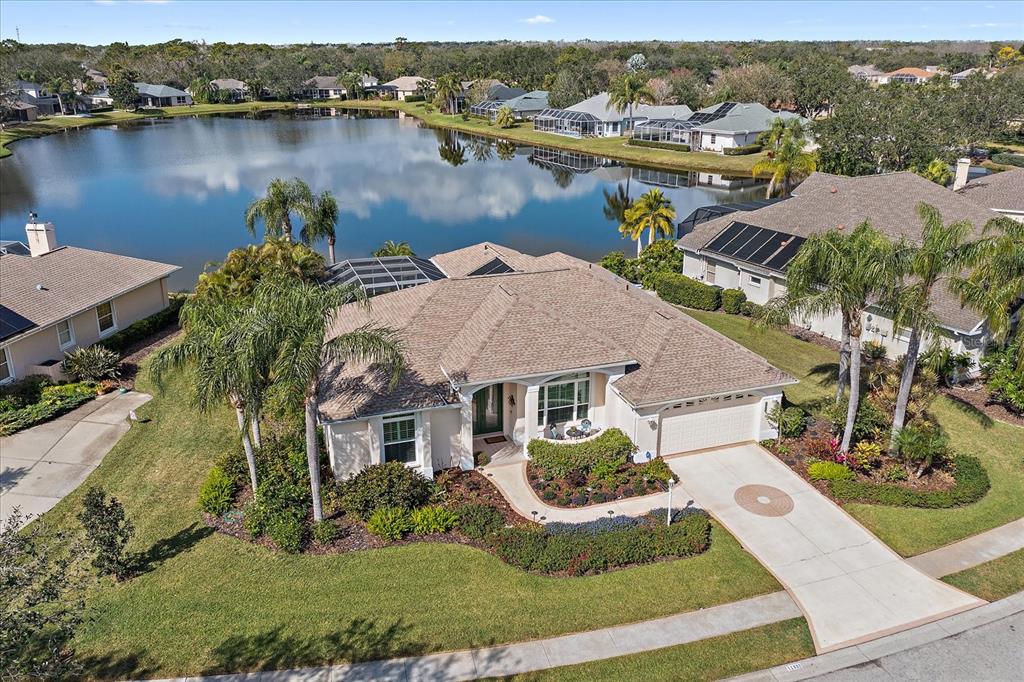 11332 Rivers Bluff Circle Lakewood Ranch, FL 34202 - Photo 1 of 1 an aerial view of house with yard and lake view