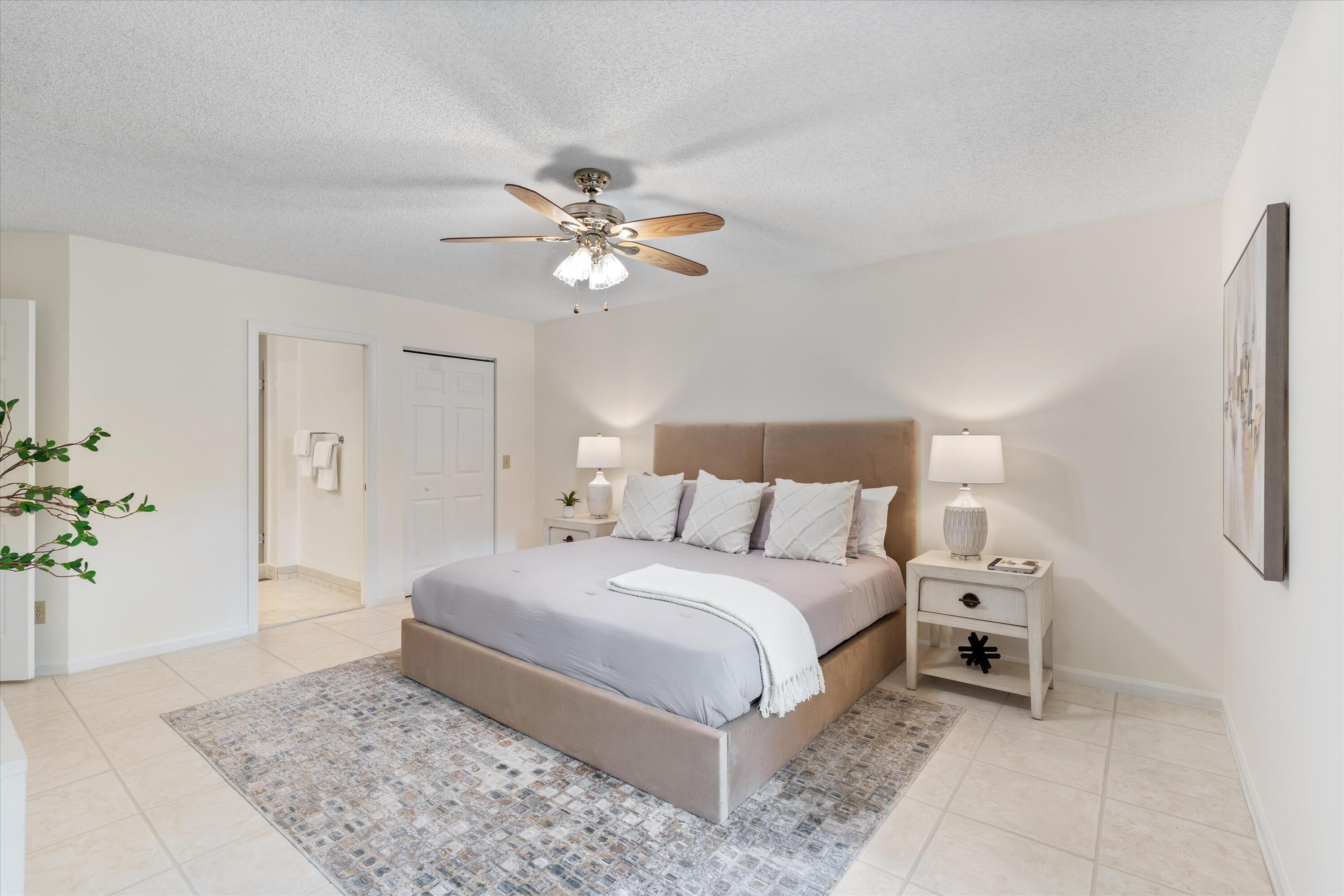 5620 Coach House Circle, Unit D Boca Raton, FL 33486 - Photo 11 of 27 Primary Bedroom