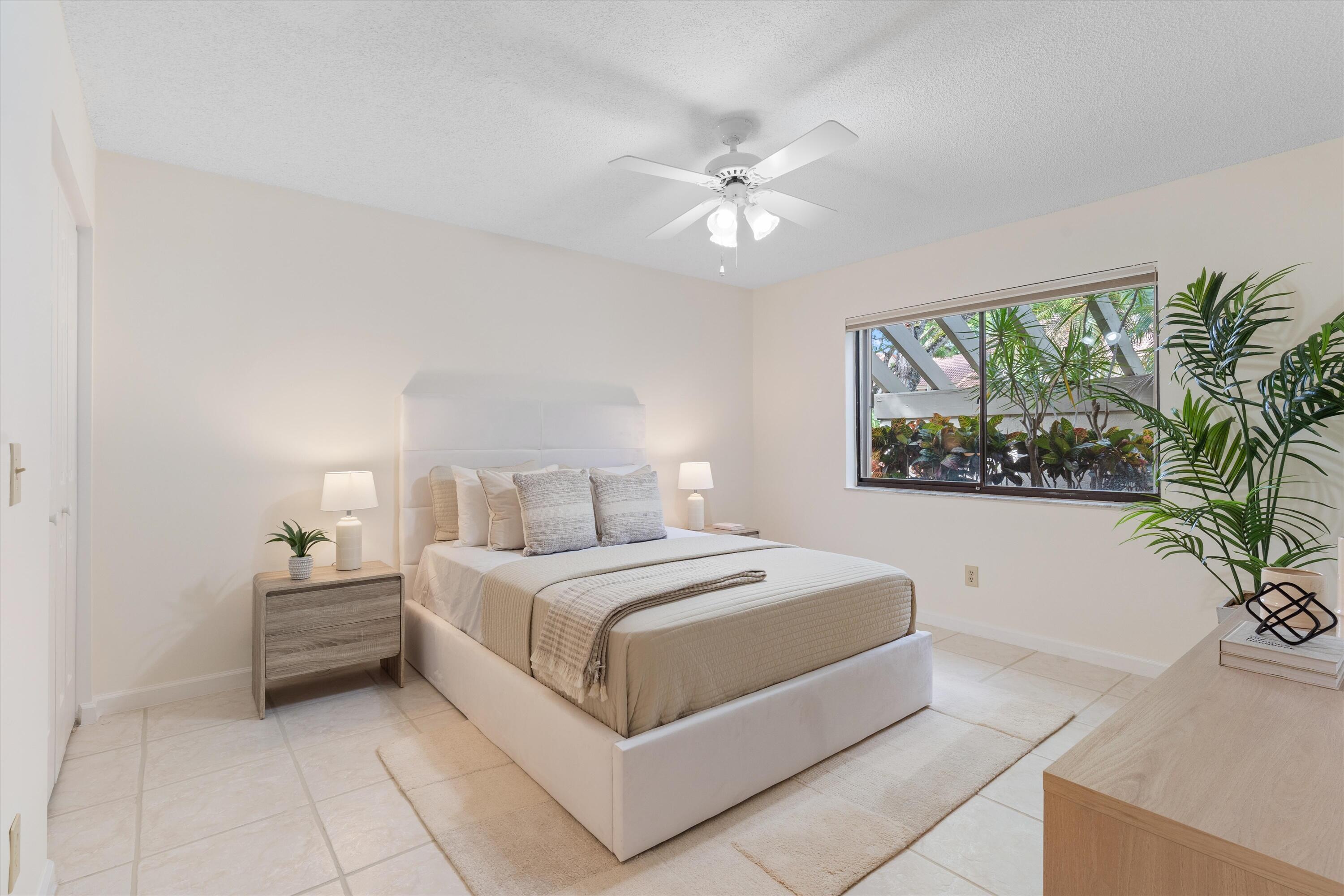 5620 Coach House Circle, Unit D Boca Raton, FL 33486 - Photo 17 of 27 Guest Bedroom