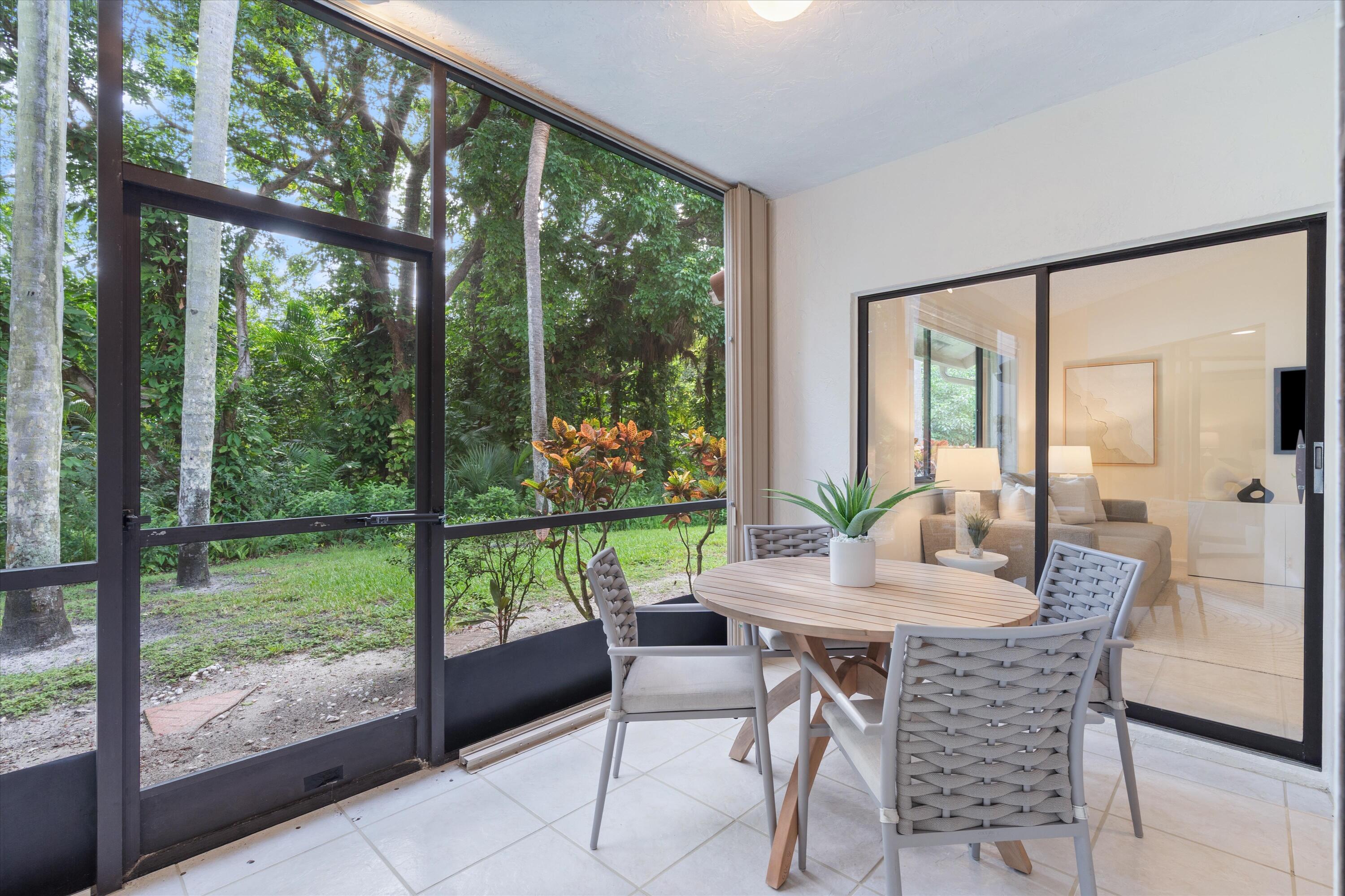 5620 Coach House Circle, Unit D Boca Raton, FL 33486 - Photo 24 of 27 Patio with view to the preserve