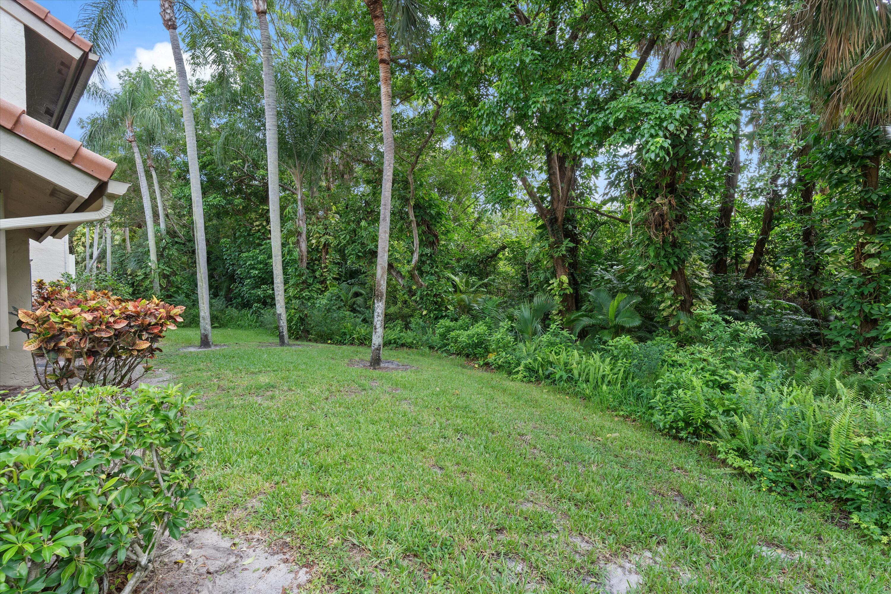 5620 Coach House Circle, Unit D Boca Raton, FL 33486 - Photo 25 of 27 Backyard next to the preserve