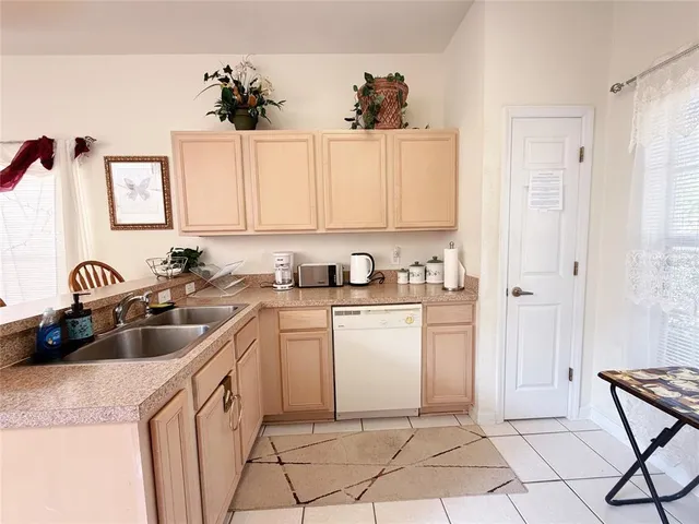 a view of a livingroom with furniture window and wooden floor