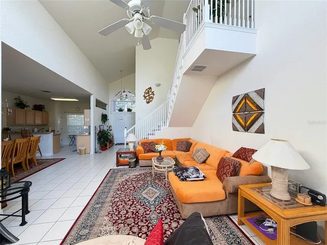 a bedroom with bed and window