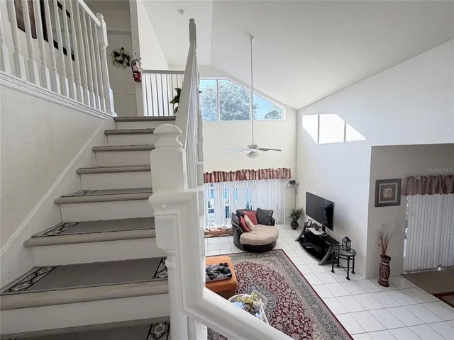 a bedroom with a bed and a chair