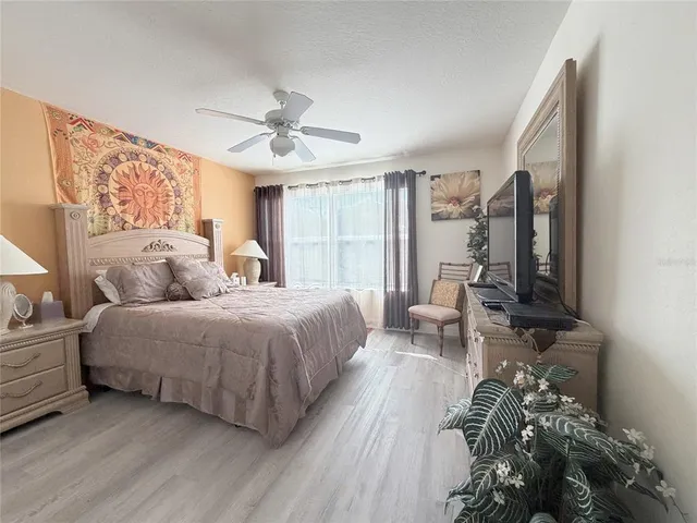 a view of a patio with a table and chairs