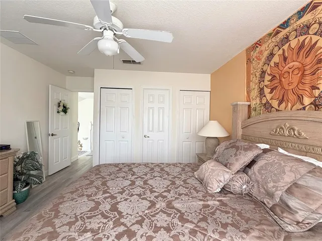 a view of a swimming pool with outdoor seating