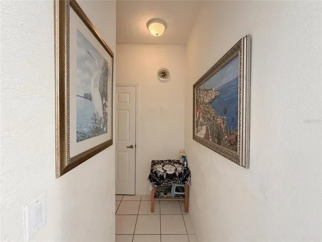 a bathroom with a sink vanity and mirror
