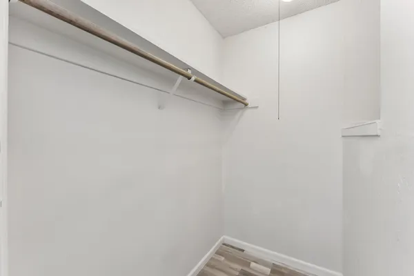 a view of small space with racks on the wall