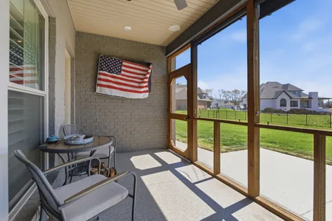 a view of a balcony dining area