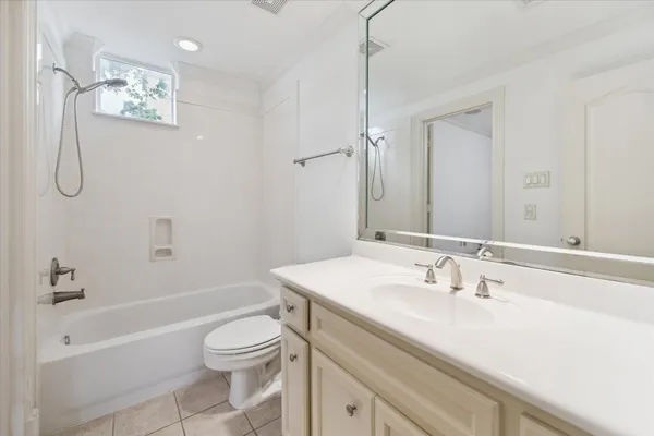 a bathroom with a sink a toilet and a bathtub
