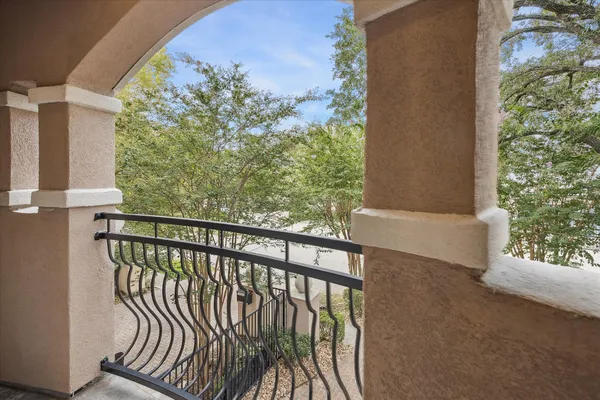 a view of a balcony with an outdoor space