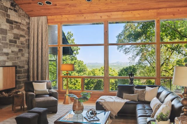a living room with furniture and a window