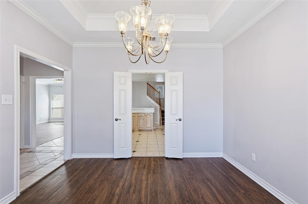 135 Rim Rock Road Aledo, TX 76008 - Photo 15 of 40 a view of empty room with wooden floor