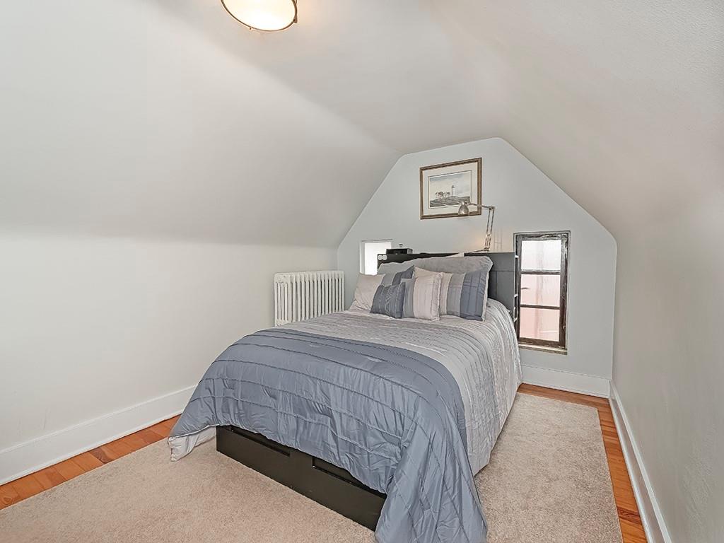 644 Beverly Road Pittsburgh, PA 15243 - Photo 19 of 26 a bedroom with a bed and a window